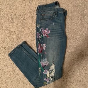 Express blue jeans with flower detail
